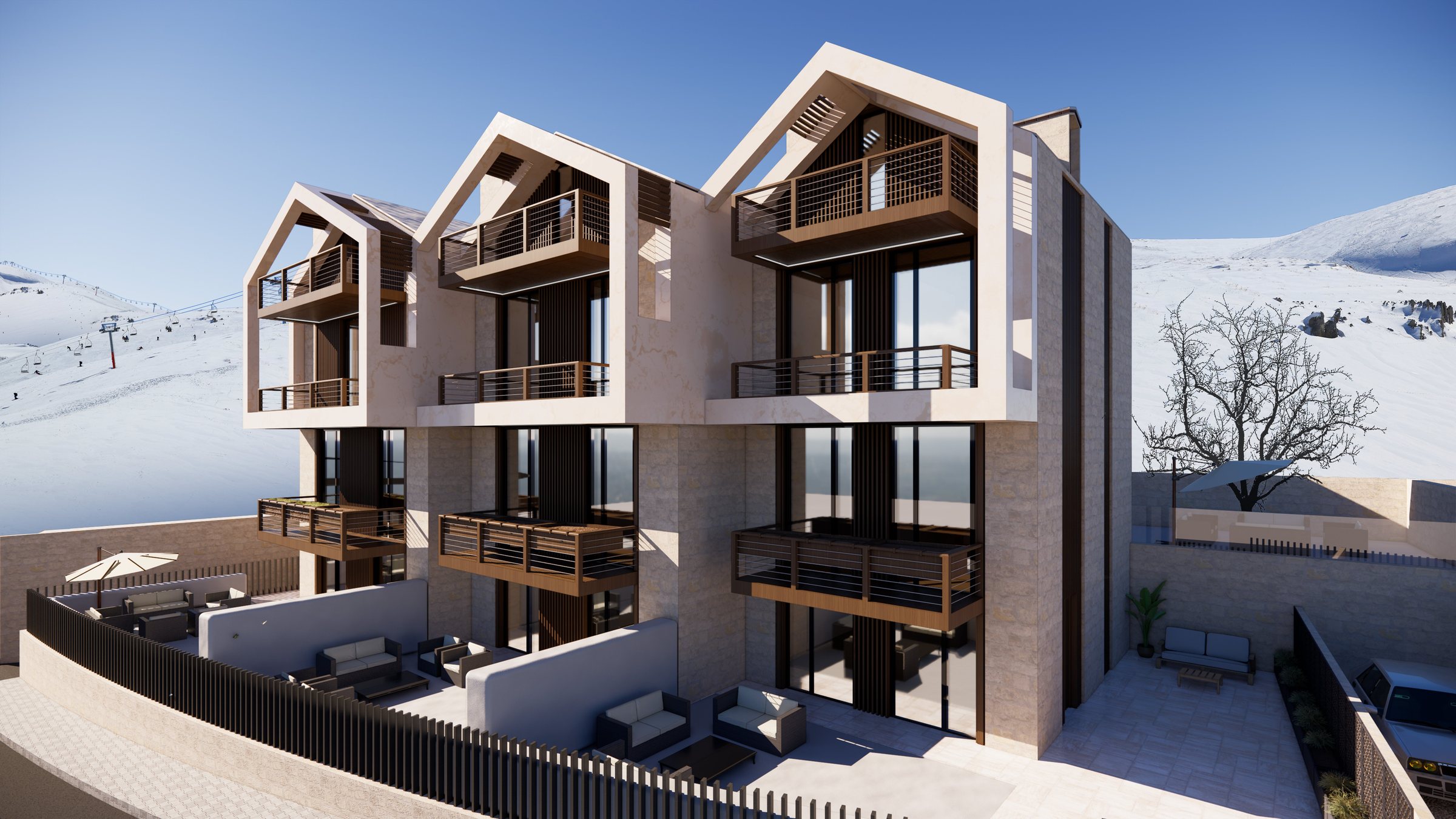 The three gabled volumes against the ski slopes